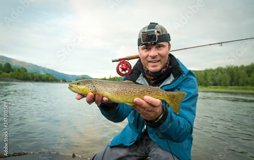 Brown trout fly fishing happiness
