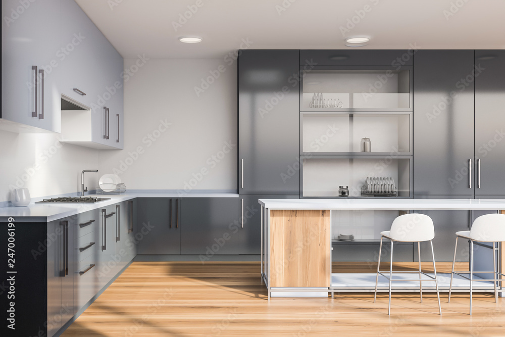 Kitchen with gray cupboard and bar Kitchen with gray cupboard and bar