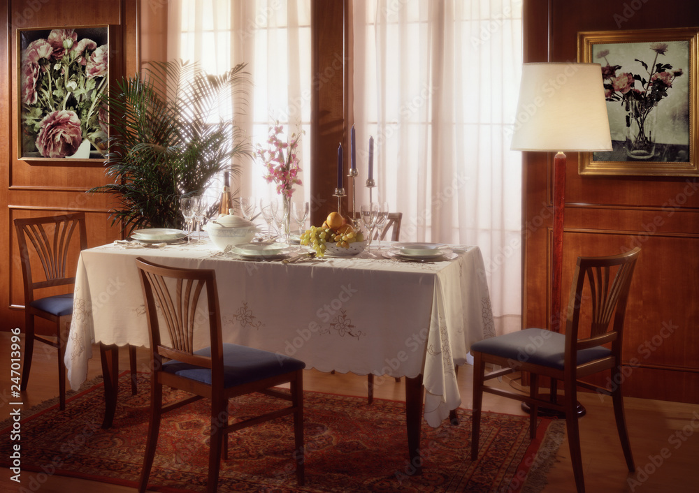 Fototapeta premium Ambiente con tavola imbandita