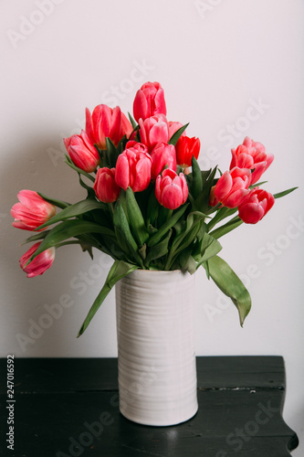 Fototapeta Naklejka Na Ścianę i Meble -  Colorful tulips easter decoration in a home. Spring concept
