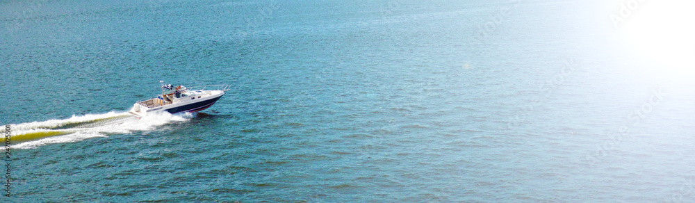 Summer Seascape with Clear Blue Water, Yacht. Copy Space Background.