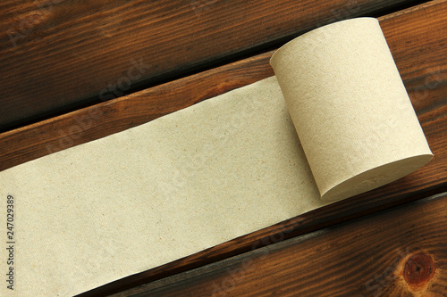 Paper. Toilet paper on wooden background