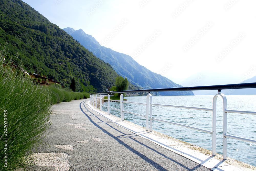 Beautiful view of the coast of Italy. Lake with along the coast of Italy. Sunny day on the coast of the Italian coast.