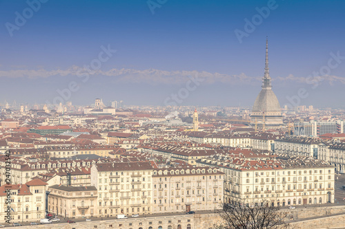 Overview of the city of Turin, seen from the "Monte dei Cappuccini". Sunny day in winter with light atmospheric pollution.