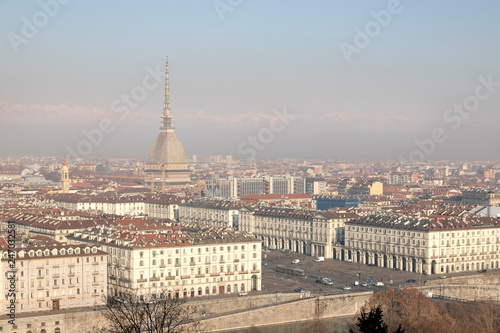 Overview of the city of Turin, seen from the "Monte dei Cappuccini". Sunny day in winter with light atmospheric pollution.