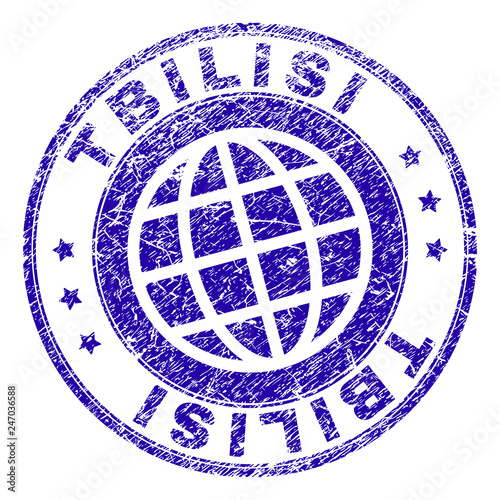 TBILISI stamp print with grunge texture. Blue vector rubber seal print of TBILISI text with grunge texture. Seal has words arranged by circle and planet symbol.