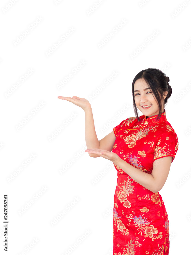 Asian woman in Chinese dress traditional cheongsam isolate on white background. Chinese new year Concept. Asian woman in Chinese dress traditional cheongsam isolate on white background. Chinese new year Concept.