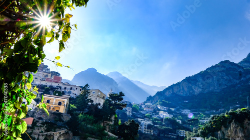 Positano Afternoon Delight, with sun rays popping behind the tree, Amalfi coast, Italy.