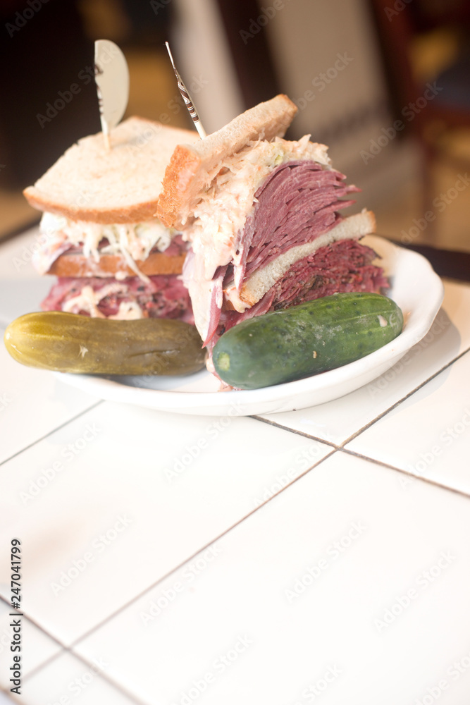 Kosher deli combination sandwich pastrami corned beef tongue cole slaw