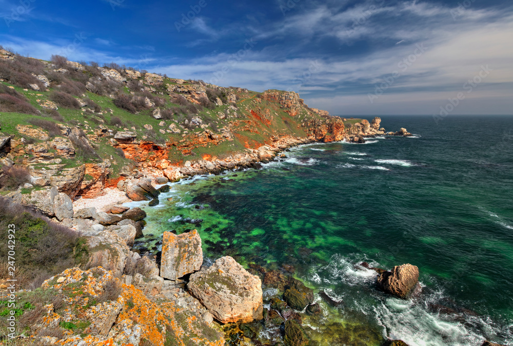 Beautiful landscape with blue sea and rocky shore