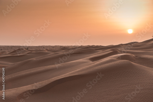 Sunset in the desert, the sun goes down