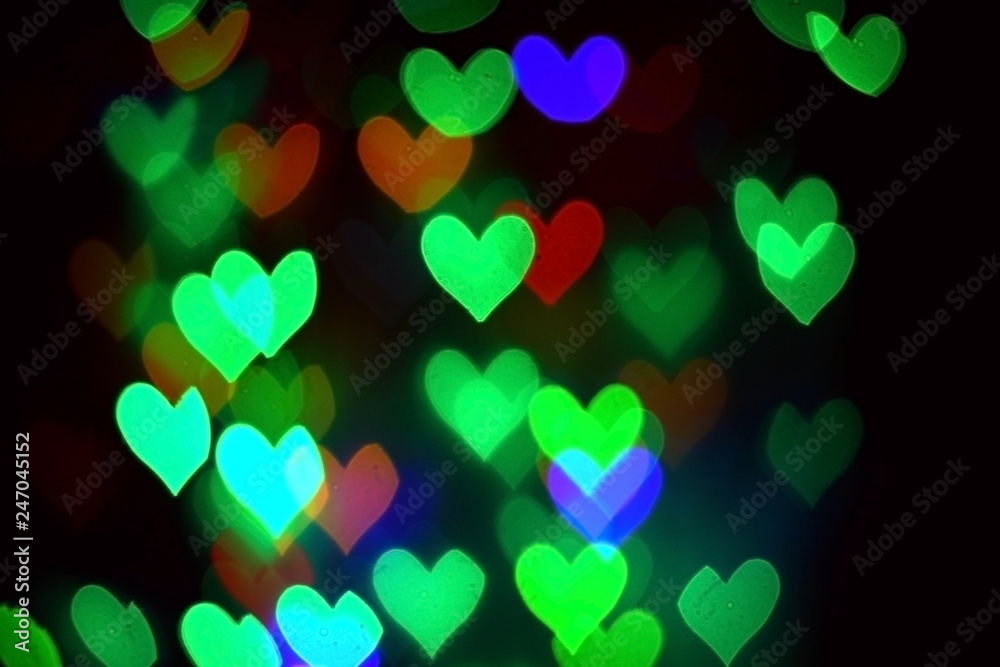 colorful bokeh in the shape of hearts colorful bokeh in the shape of hearts
