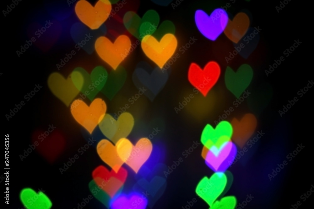 colorful bokeh in the shape of hearts colorful bokeh in the shape of hearts