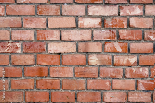Abstract close up shot of brick-red wall