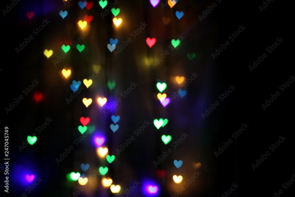 colorful bokeh in the shape of hearts