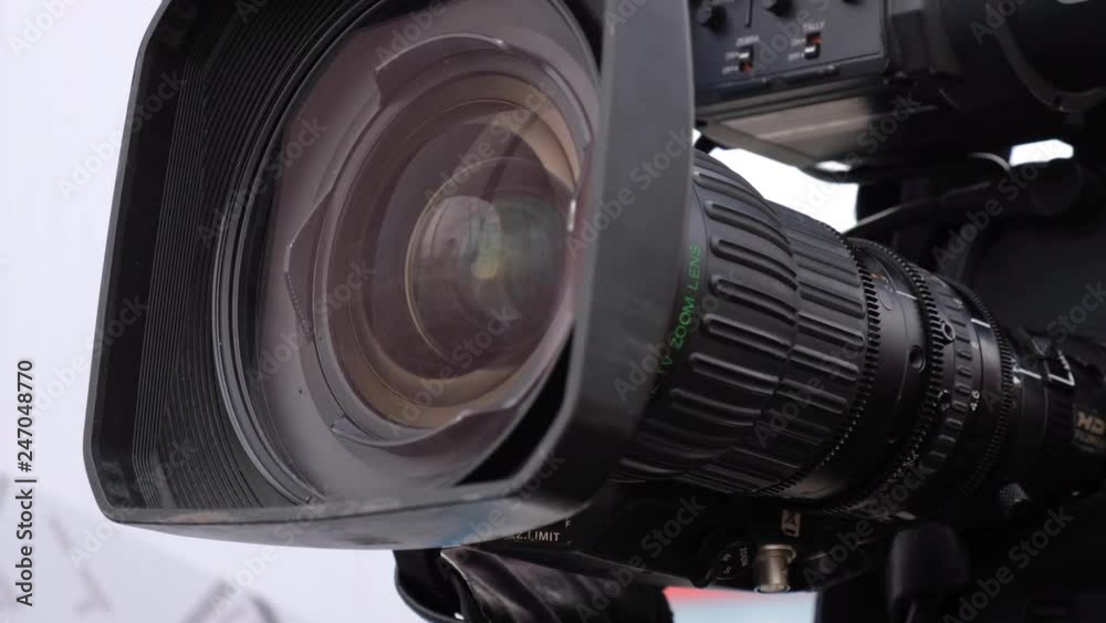 Television cameras in a row broadcasting a live media event