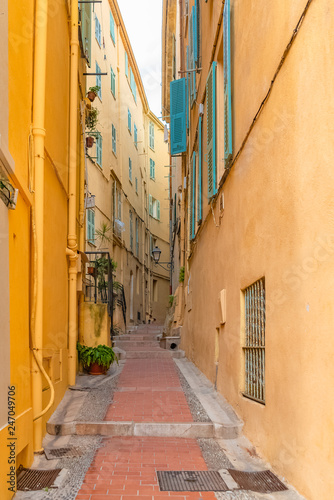 Menton  narrow street in the old town  French Riviera  typical houses