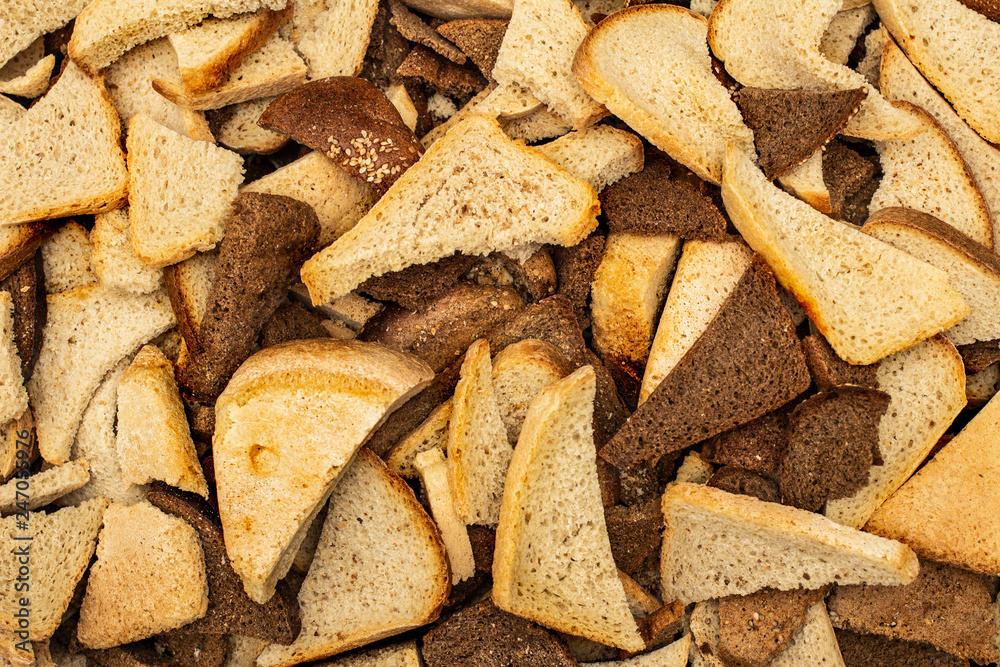 lots of pieces of wheat and rye bread close-up texture lots of pieces of wheat and rye bread close-up texture