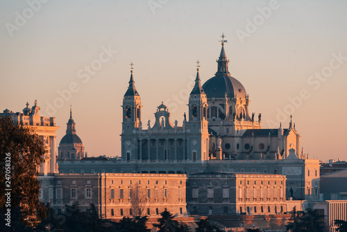 View of the Almudena Cathedral at sunset, from the Templo de Debod, in Madrid, Spain