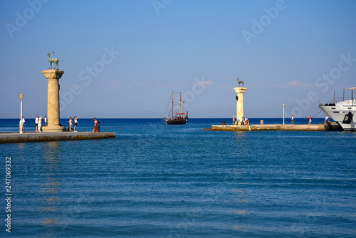 Cruise ships call into the deepwater harbour in Rhodes Greece. Mandraki is the ancient harbour with tour boats
