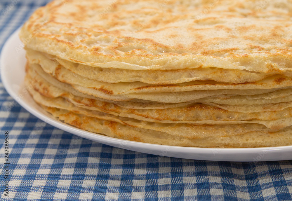 pancakes on a white plate close-up