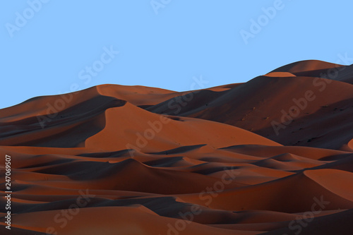 Moroccan Sahara sand dunes and shadows at sunset