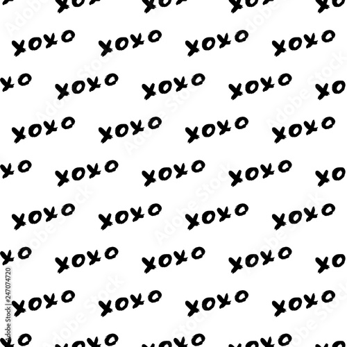 Seamless pattern XOXO on white background. Grunge hand written brush lettering XO. Hugs and kisses abbreviation symbol. Easy to edit template for Valentine’s day. Vector illustration.