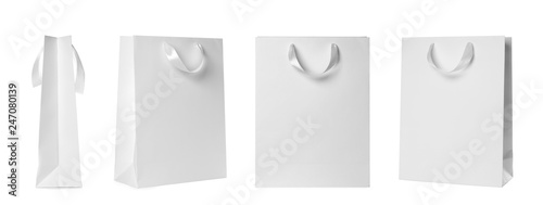 Set of paper bags for shopping on white background. Mockup for design photo