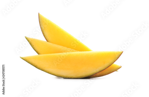 Slices of delicious ripe mango on white background photo