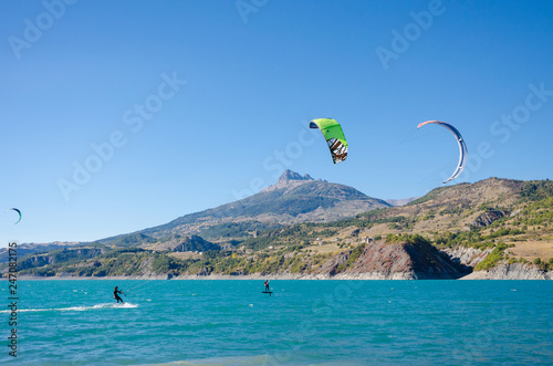 Kite hydrofoil and kite surfing on the lake of Serre Ponçon in Provence-Alpes-Côte d'Azur, France