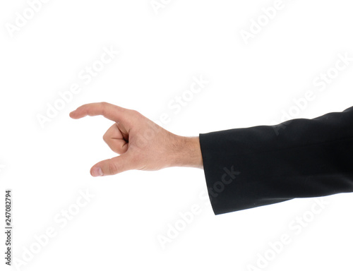 Man holding magnet on white background, closeup