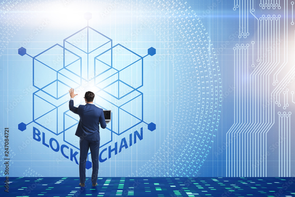 Young businessman in innovative blockchain concept Young businessman in innovative blockchain concept