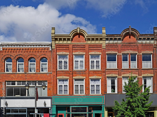 Fototapeta Naklejka Na Ścianę i Meble -  Facades of preserved 19th century commercial buildings of the type found in some older North American small town main streets