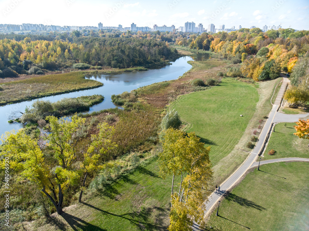 panoramic aerial view of city park during fall season. autumnal natural landscape