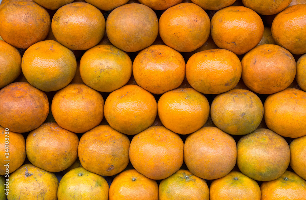 Closeup of many oranges on a fruit shop in market. Closeup of many oranges on a fruit shop in market.