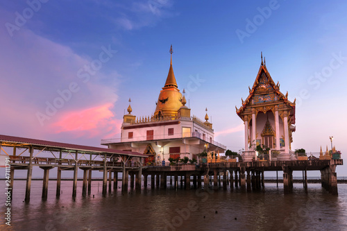 Blue sky at sunset and wat hong thong  temple built in the sea with a bridge connect to travel in chachengsao province.