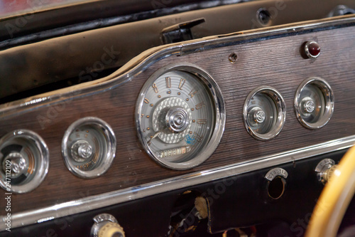 Instruments and a panel with a speedometer and a tachometer of interior an old Russian retro car executive class, released in the USSR