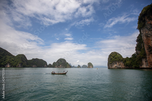 Landscape of Phi Phi island scenic beautiful place in sunny day, Traveling with wooden boat adventure famous nature sea beach Krabi, Travel Phuket Thailand, Summer holidays vacation trip, Tourism Asia