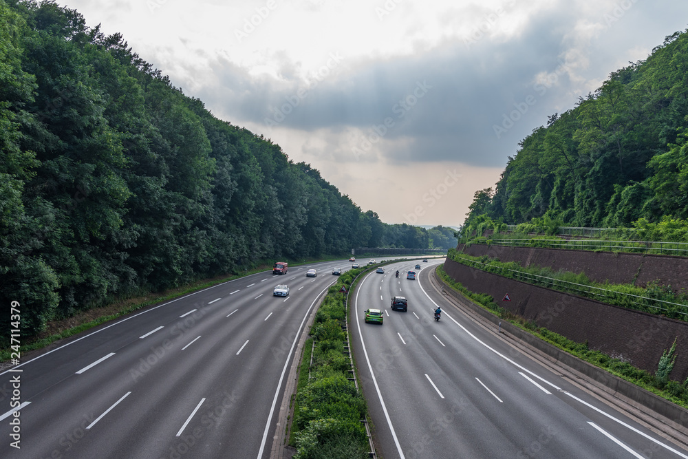 The highway through a forest in Germany