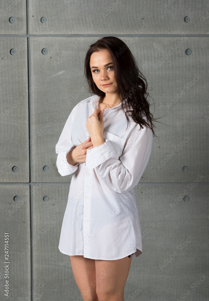 Portrait of a young beautiful woman in studio. Portrait of a young beautiful woman in studio.