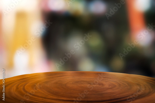 blank wood table with blurred party outdoor background.