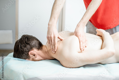 Close-up of physical therapist doing medical massage