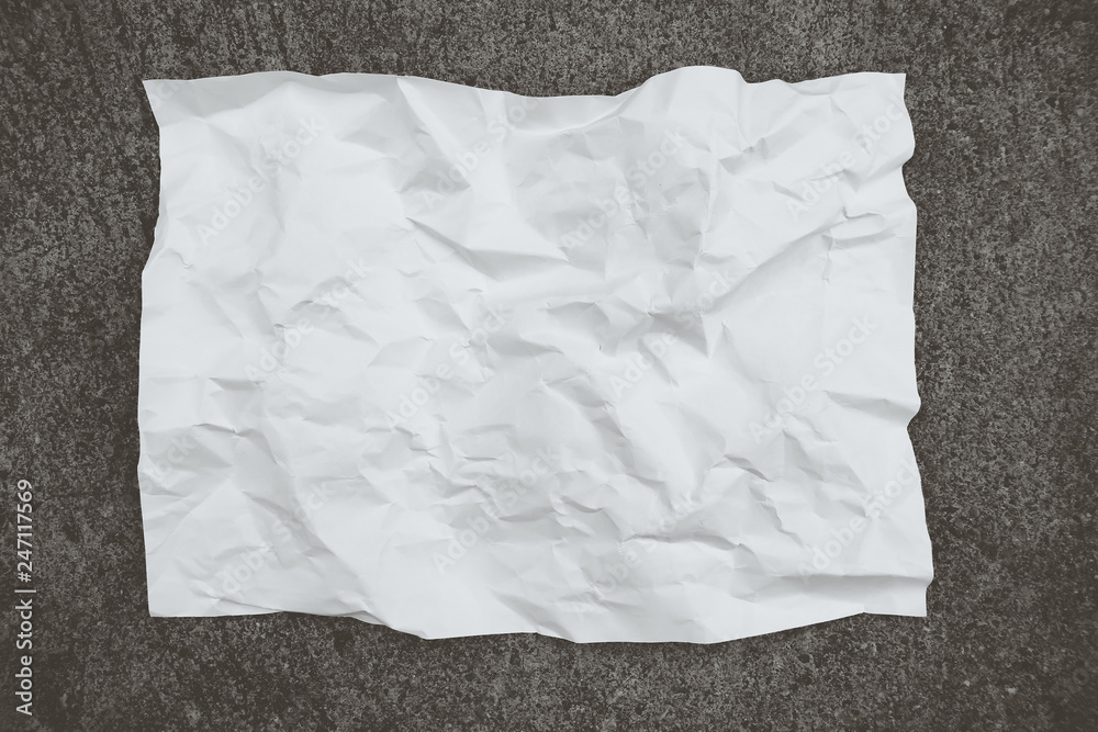 Obraz premium crumpled paper on white background, Blank crumpled paper and background for design with copy space., Crumpled paper sheet on black color background, Black and white concept.