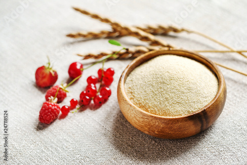 Obraz na plátně Raw unprepared semolina in bowl