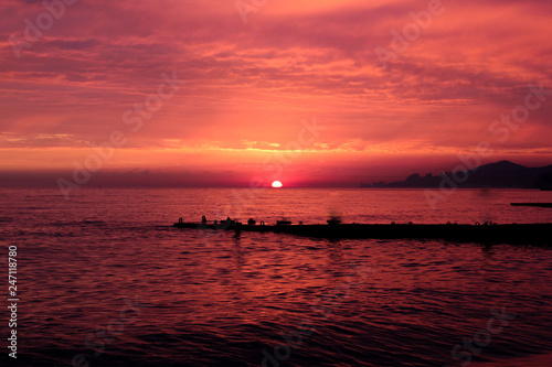 Red sunset at the seaside © Katusha