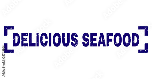 DELICIOUS SEAFOOD text seal print with corroded effect. Text caption is placed between corners. Blue vector rubber print of DELICIOUS SEAFOOD with unclean texture.