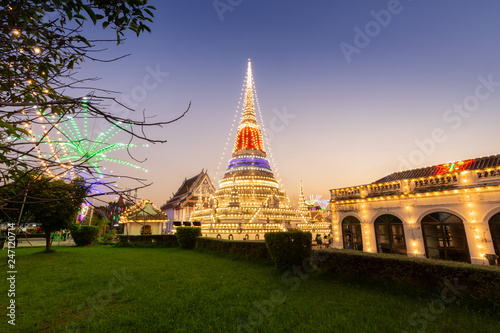 Stupa at temple phra samut chedi decorated with electric bulbswith and beautiful sky in twilight time, samut Prakan, Thailand. Temple festival.