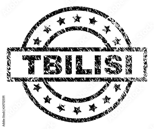 TBILISI stamp seal watermark with distress style. Designed with rectangle, circles and stars. Black vector rubber print of TBILISI text with corroded texture.