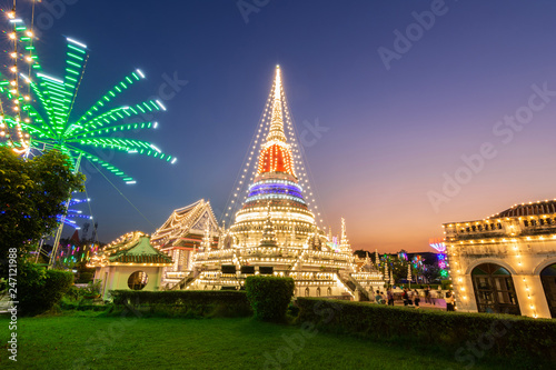 Stupa at temple phra samut chedi decorated with electric bulbswith and beautiful sky in twilight time  samut Prakan  Thailand. Temple festival.
