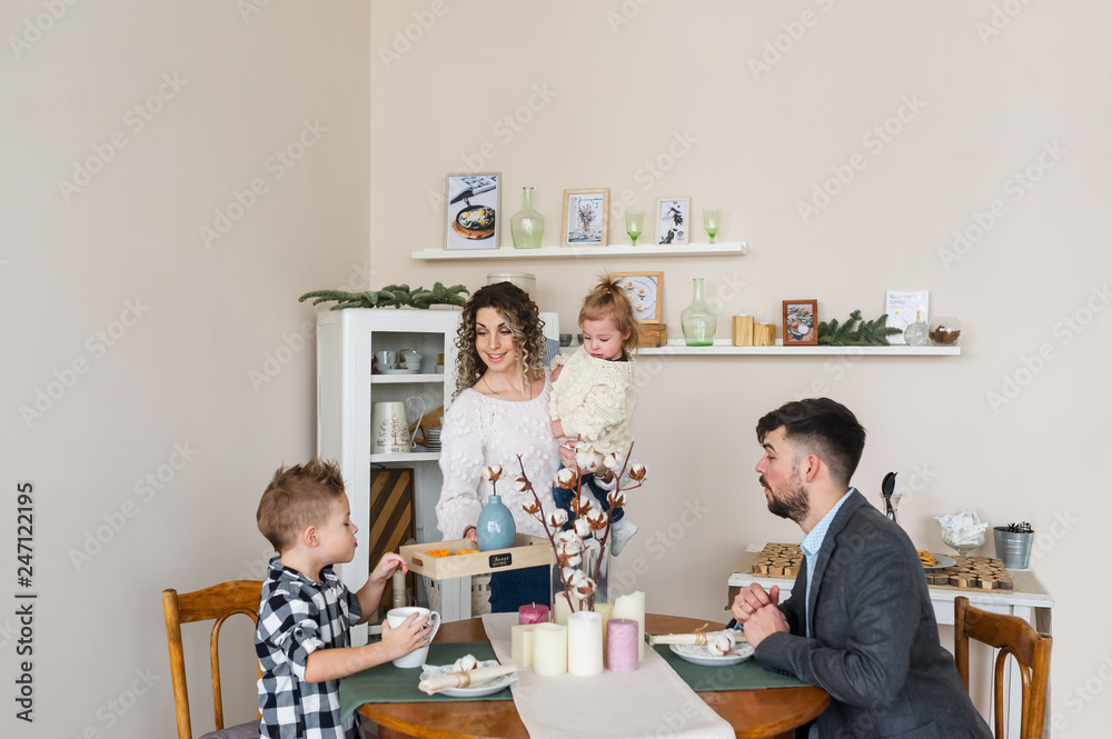 Happy family having breakfast at home. Happy family having breakfast at home.